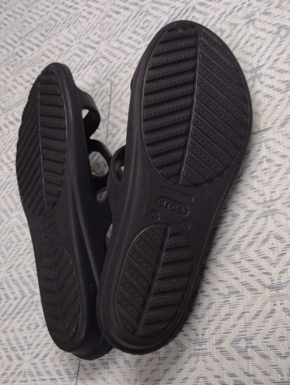 CROCS Black Slide Sandals with Silver Ring Detail